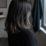 Black short hair with pale frosted tips and textured top